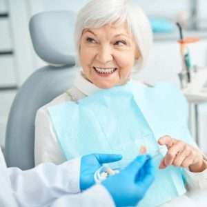 Patient Smiling Denture